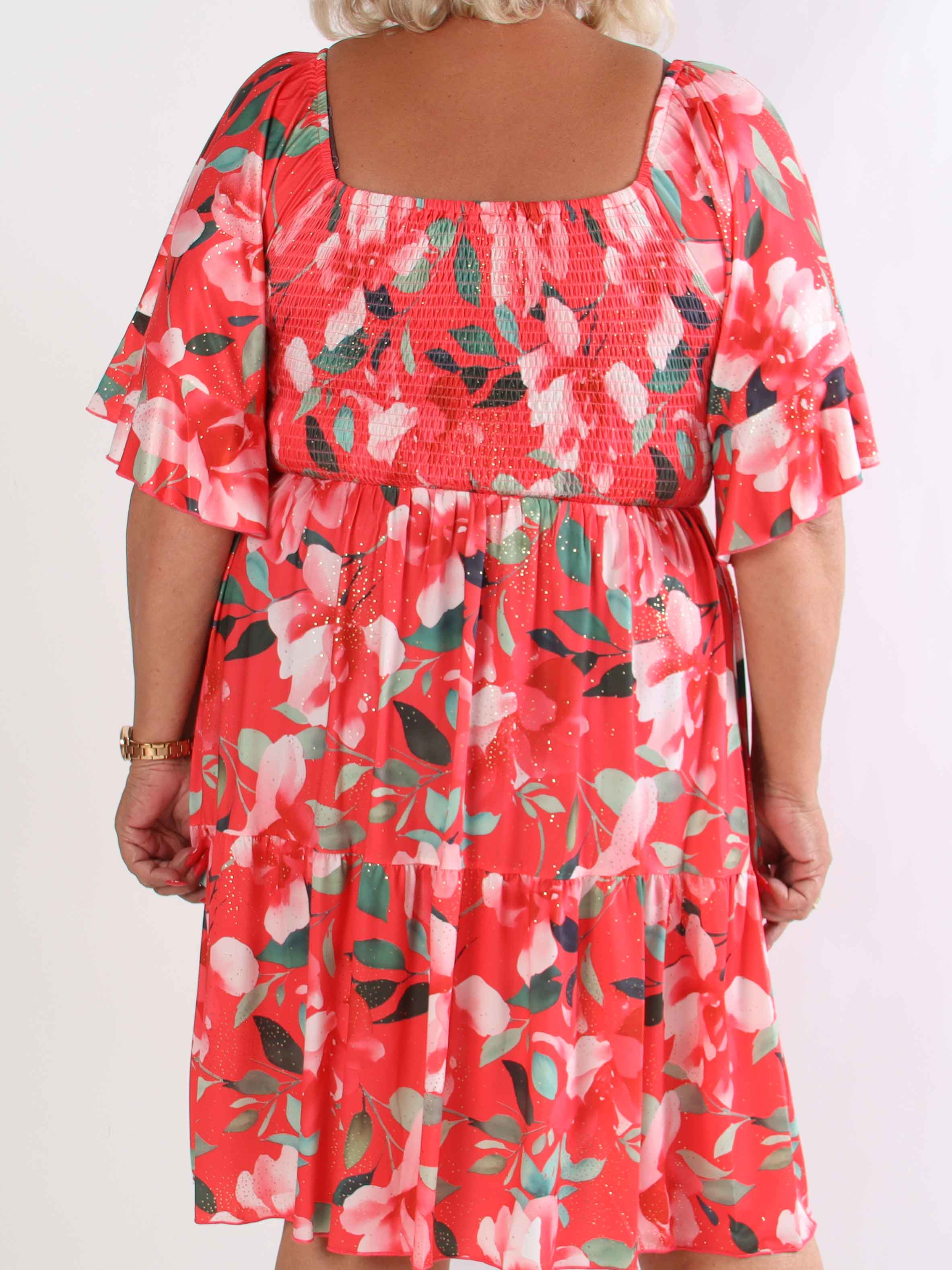 Elna Fiore Short - Blomstret elastisk plus size kjole med smock over brystet
